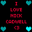 Pixel art animation with red text and cyan hearts on black background, showing alternating heart arrangements.