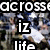 Pixelated image with repeated text 'across iz life' over a blurred crowd background, showing no animation.
