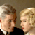 Static 50x50 pixel buddy icon showing two side-by-side human figures with light-colored hair against a neutral background, rendered in low-resolution pixel art style.