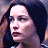 A 48x48 pixel buddy icon featuring a side-profile of a woman with dark hair and light skin on the left, next to "The Lord of the Rings: The Return of the King" text in gold lettering on a brown background.