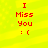 Red pixelated text "I Miss You :(" on a bright yellow background with subtle horizontal stripes.