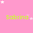 Pink background with repeated green text 'sabrina' and scattered white stars in a pattern