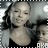 A static image of a with four showing a woman in various poses and a central text block with 'SUPERWOMAN ALICIA KEYS' text