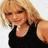 A pixelated image of a person with blonde hair wearing a black sleeveless top, next to green background with purple text reading 'I HATE HILARY!' in all caps.