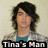 Pixelated image of a person with dark shoulder-length hair wearing a teal top and gray jacket against a light beige background with text overlay.