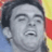 Static 48x48 pixel icon showing a close-up of a person's face with closed eyes and mouth open in an expressive pose, set against a colorful background with red, yellow, blue, and gray tones.
