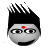 Pixelated face with black spiky hair, red bindi on forehead, glasses, and a slight smile against gray background.