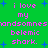 Green background with blue starbursts and repeated pink text reading 'i love my wandsomneswandsomnes belemic shark.'