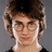 Pixelated image of a person with brown hair and glasses on gray background, surrounded by red containing text