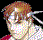 Pixelated image with a character's face on the left and text 'Wanna Fight?' on black background, below which is an abstract colorful shape.