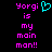 Pixelated text reads 'Yorgi is my main man!!' in bright pink on black background with cyan heart symbol next to first instance.