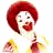 A pixelated image of a person with red hair and white face paint holding two burgers, next to green text reading 'Original Icons .com' on dark background.