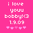 Pixelated text on bright pink background with animated heart symbols changing position.