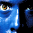 Pixelated blue face profile with white text 'BLUE MAN GROUP' on black background in a 2-frame contact sheet layout.