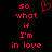 Red pixelated text on black background with a red heart symbol above the left of text