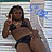 Pixelated image of a person in dark swimwear holding a phone to their ear against a striped background with blue accents.