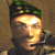 A 2x2 contact sheet of four animated frames showing a pixelated character with a green and red checkered headband, holding a weapon against a brown background.