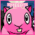 Pixelated pink cat-like character with large eyes and a small mouth, wearing a collar with a bell, against a blue sky background.