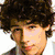 Six distinct pixelated images arranged in a , featuring individual and group portraits of young men with varied hairstyles and clothing against solid backgrounds