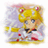 Pixelated anime-style character with blonde hair, red hair accessories, blue eyes, and a white-and-pink outfit with black accents against a light purple background.