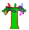 Green T-shaped figure with red outline, green foliage on top, and colored lights changing