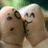 Two identical cartoon-style figures with light skin and brown hair hold hands against a blurred green background, one figure's text changes from 'Can' to 'true love??'.