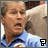 pixelated images showing a person in a blue shirt with changing text overlays and a thumbs-down symbol