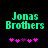 Pixelated green text 'Jonas Brothers' on black background with pink and purple heart symbols below, two variations of heart arrangement visible.