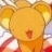 A static pixelated image of a yellow cartoon character with rounded ears, a small red nose, and a red and white striped garment.