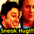 Pixelated image of two people with dark hair and light skin, one smiling broadly while the other looks neutral, both wearing blue shirts under a yellow banner reading 'Sneak Hug!!!'
