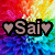Pixelated icon with 'Sai' text flanked by two hearts, set against a rainbow gradient background transitioning from red to yellow to green to blue.