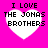 Four identical white heart shapes on a bright pink background, each containing black pixelated text reading "I LOVE THE JONAS BROTHERS".