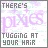 Pixelated image with text 'THERE'S PIXIES TUGGING AT YOUR HAIR' in gray and purple, featuring subtle animation changes across frames.