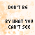 Pixelated text on a light orange background with multiple variations of the phrase "DON'T BE FOOLED BY WHAT YOU CAN'T SEE" in different styles and colors.