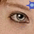 Close-up of human eyes with two blue star-shaped icons overlaid on the face.