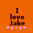 Orange background with dark brown text reading "I love Jake" and five pink heart symbols below, showing different heart arrangements