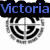 A four- displays a circular emblem with concentric rings and crosshairs, overlaid by blue text on black bars that changes