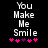 Pixelated text "You Make Me Smile" with pink and purple heart symbols on a black background, showing animation changes in heart colors.