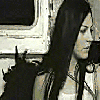 Black-and-white animated sequence showing a woman with long dark hair in three distinct poses against a vehicle background.