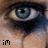 A 3x3 contact sheet of a single eye animation with text overlays, showing subtle frame-to-frame changes in the eye's expression and surrounding skin tones.