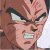 Pixelated close-up of a character with brown hair, dark eyebrows, and light-colored eyes showing an intense expression.