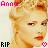Pixelated image of a person with light brown hair, closed eyes, and red lips, with text elements 'Amos' and 'RIP' visible.