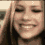 A 4-frame contact sheet of a woman's face showing subtle facial expression changes across frames, with visible pixelation and low-resolution rendering typical of early internet graphics.