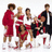 Group of people in red and white outfits with one person in black, standing on white background with red text.