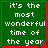 Green square with red border displays white text 'it's the most wonderful time of the year' and a small red pixelated symbol at bottom right.