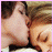 A four- shows a couple lying close together with eyes closed, transitioning from no text to red pixelated 'I love you' text in different