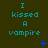 three and three displays the phrase "I kissed a vampire" in cyan text on dark green background with blue pixelated symbols changing across frames