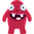 Red pixelated creature with large white eyes, wide open mouth showing four teeth, and short rounded limbs against gray background.