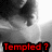 A grayscale pixelated image of a person's face with a blurred background, overlaid with red text reading "Templed?" in a bold, blocky font.
