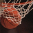 A basketball hoop with a net and a basketball partially visible, accompanied by red pixelated text on a black background.